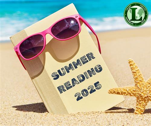 book with sunglasses and starfish on the beach